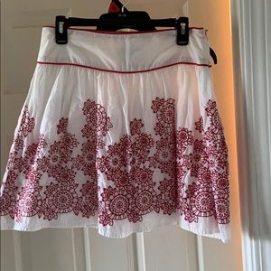 Fun flirty skirt. White with red floral. Size 7
